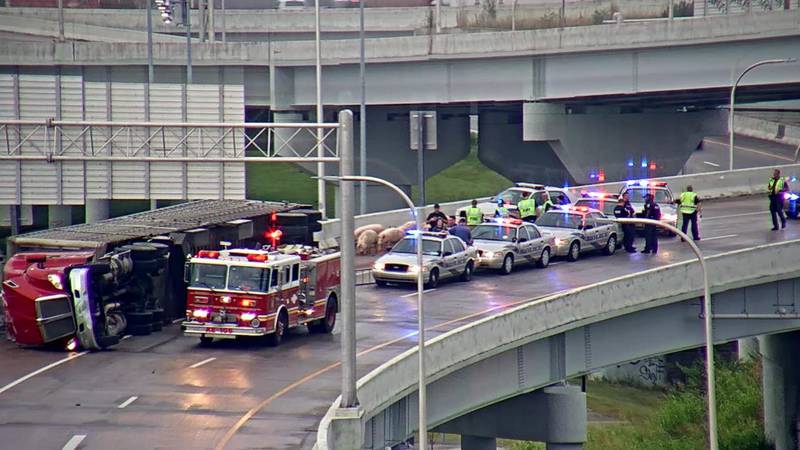 The semi overturned on I-65 South on the I-64/I-71 ramp around 7:15 a.m. Wednesday, according...