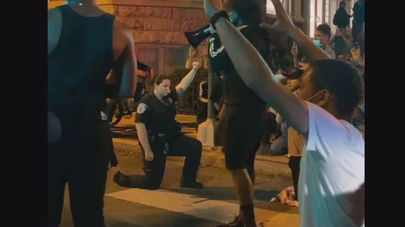 Tuesday night several Richmond Police officers took a knee in solidarity for those protesters...