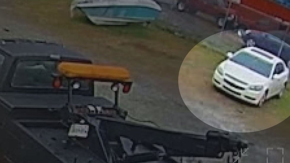 Harris says the owner of No Limit Towing texted him a photo of his Chevy Malibu in their tow lot.
