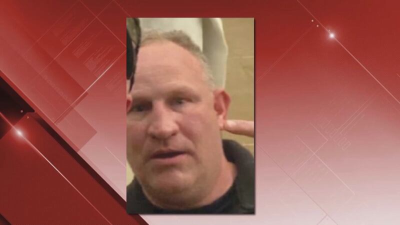 Prosecutors say while at the Capitol, Thomas Robertson carried a "large wooden stick."
