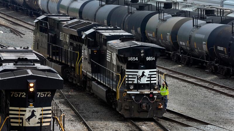 FILE - Norfolk Southern locomotives are moved through the Conway Terminal in Conway, Pa.,...
