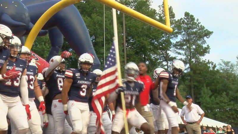 The Richmond Spiders football team gets ready to take the field for a game against Elon on...