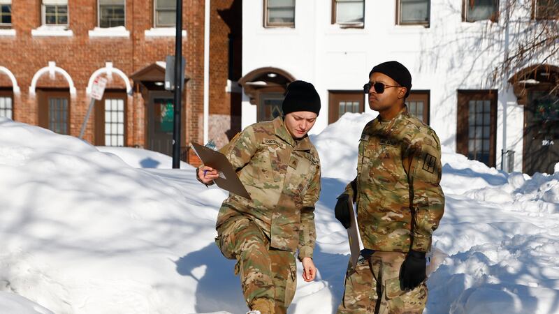National guard members check on residents, Wednesday, Dec. 28, 2022, in Buffalo N.Y.,...