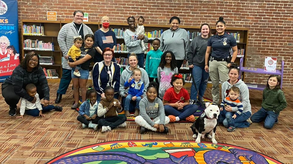 In another Facebook post, Bolo was seen visiting children at a local library, one of his many...