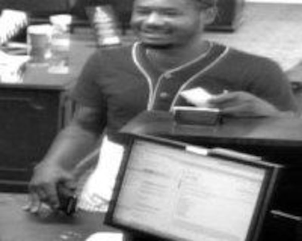 An additional image of a suspect believed to be connected to the attempted bank robbery....