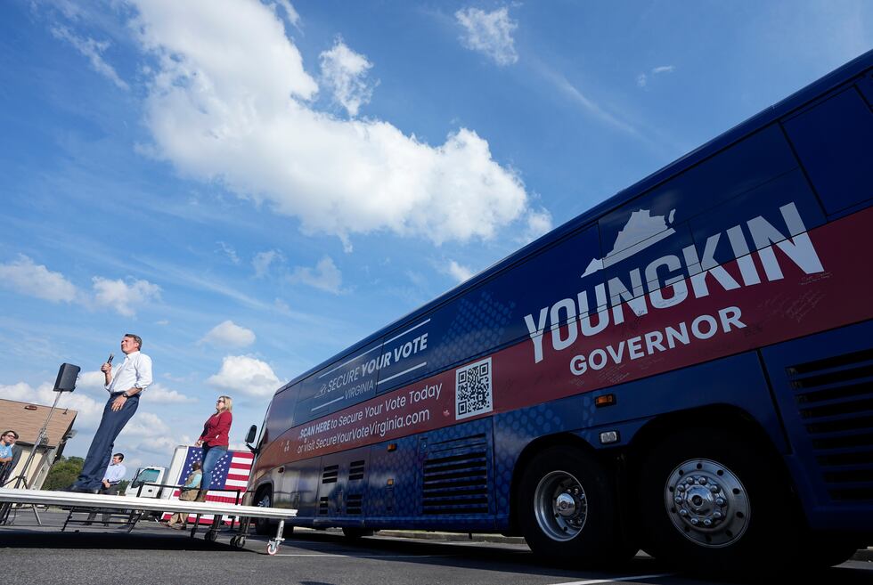 FILE - Virginia Gov. Glenn Youngkin gestures during an early voting rally, Sept. 21, 2023, in...