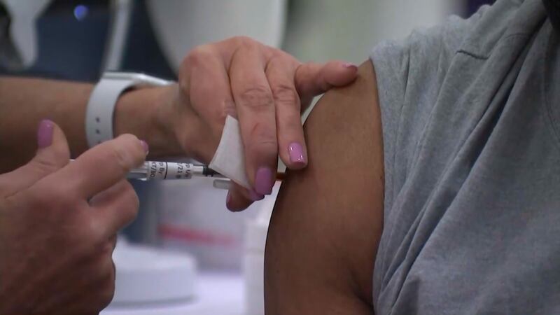 The health care system announced the mandatory vaccination program in July, stating all...