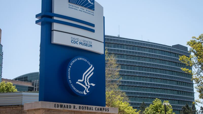 FILE - A Centers for Disease Control and Prevention sign stands at the entrance of their...
