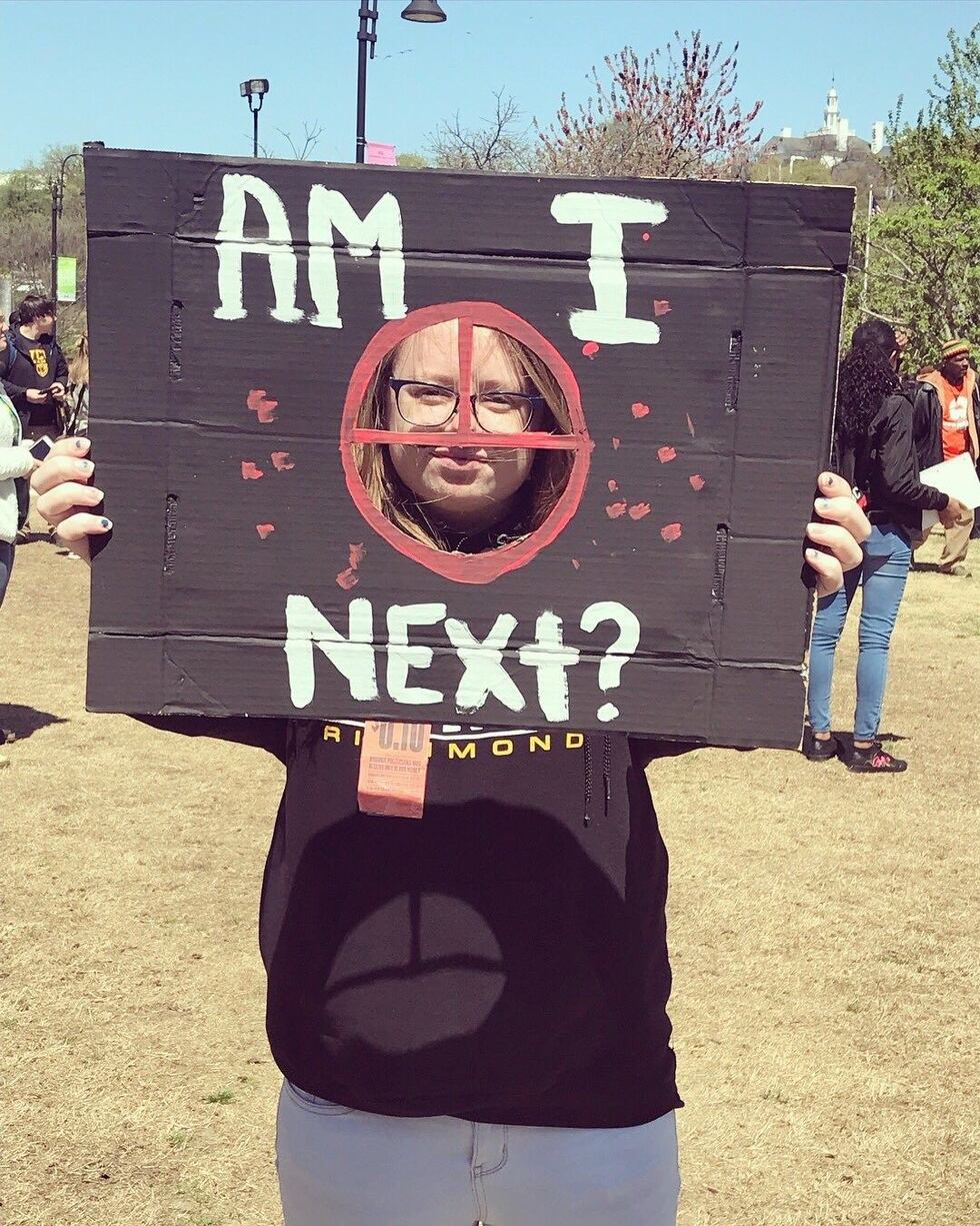 A student at Brown's Island demonstrates against violence in schools. (Source: Allison...