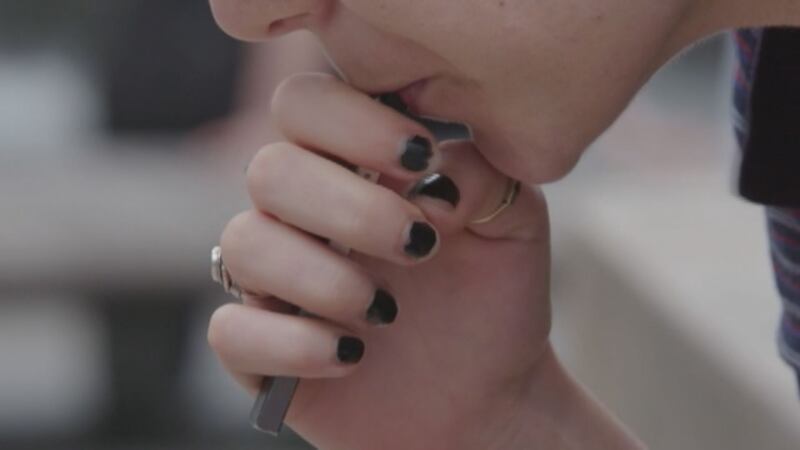 FILE - A CDC study surveyed middle and high school students on the usage of e-cigarettes and...