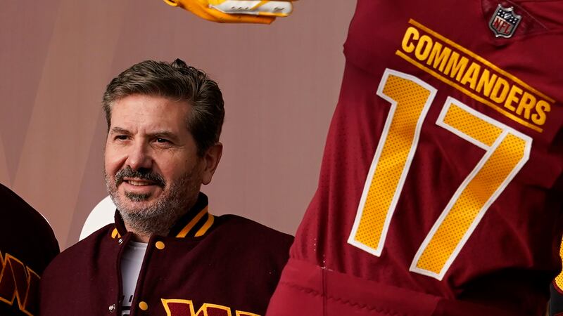 FILE - Dan Snyder, co-owner and co-CEO of the Washington Commanders, poses for photos during...