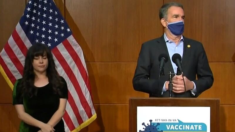 Governor Ralph Northam holding a news briefing in Richmond.