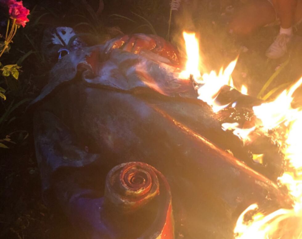 The Christopher Columbus statue has been torn down and thrown in the lake by protesters in...