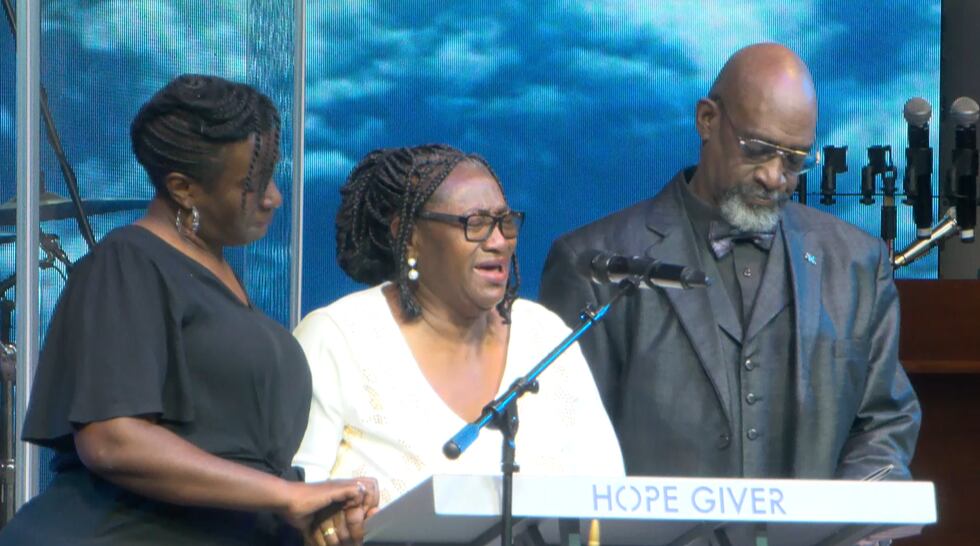 Grenda Smith speaks during a joint funeral service for her son, Renzo Smith, and her grandson,...