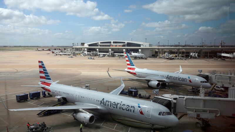 FILE - In this June 16, 2018, file photo, American Airlines aircrafts are seen at Dallas-Fort...