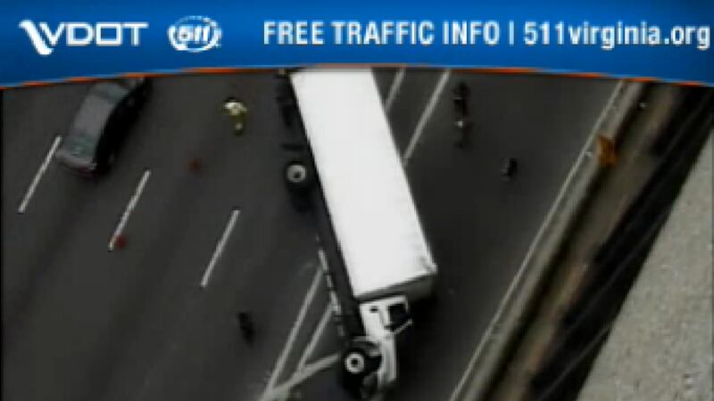 Officials say the box truck was hauling furniture when it overturned. (Source: Virginia...