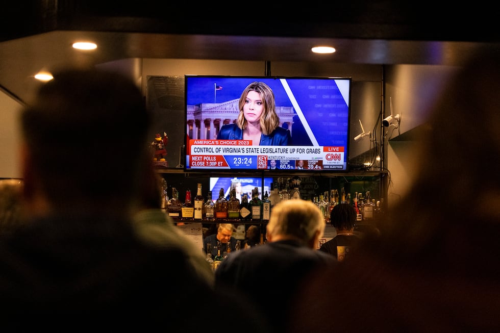 Party goers wait for election results during an election watch party for the race between...