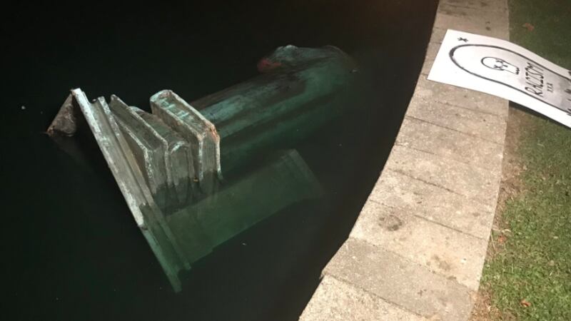 The statue was also set on fire before being thrown into the lake.