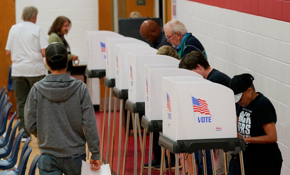 Voters make their choices at a polling station Tuesday Nov. 7, 2023, in Richmond, Va. (AP...