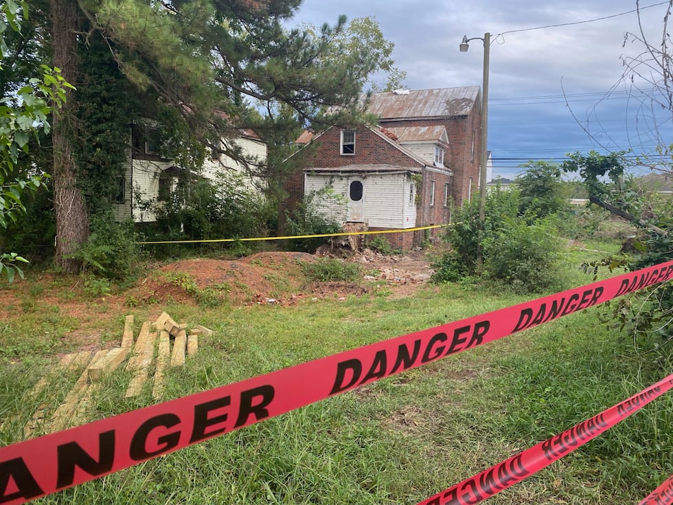 Officials said a man was inside working on the building at the time when the floor above...